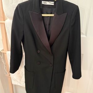 Black Double-Breasted dress with satin accents. Fully lined. Wore  only once.